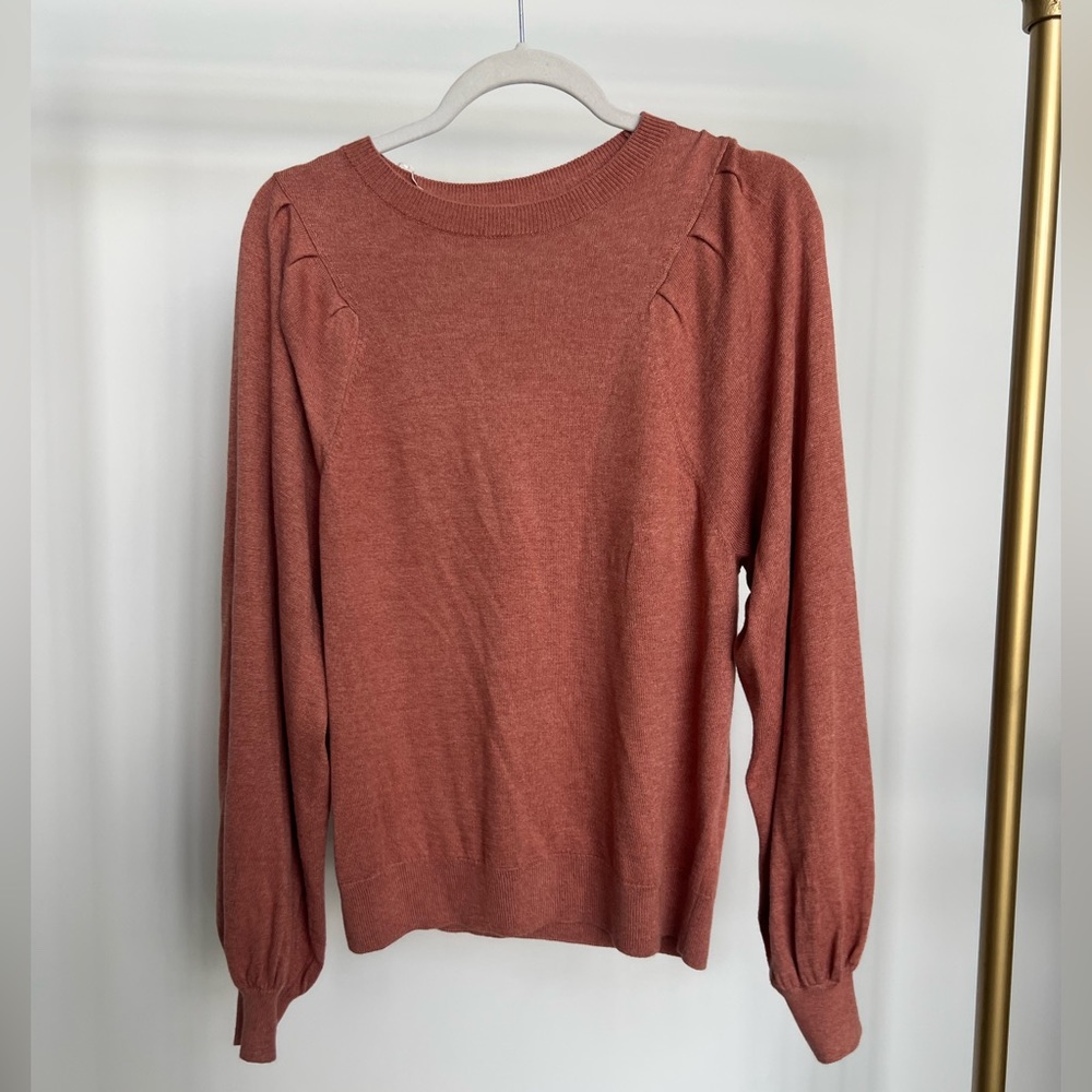 Blush pullover sweater with shoulder and sleeve detail